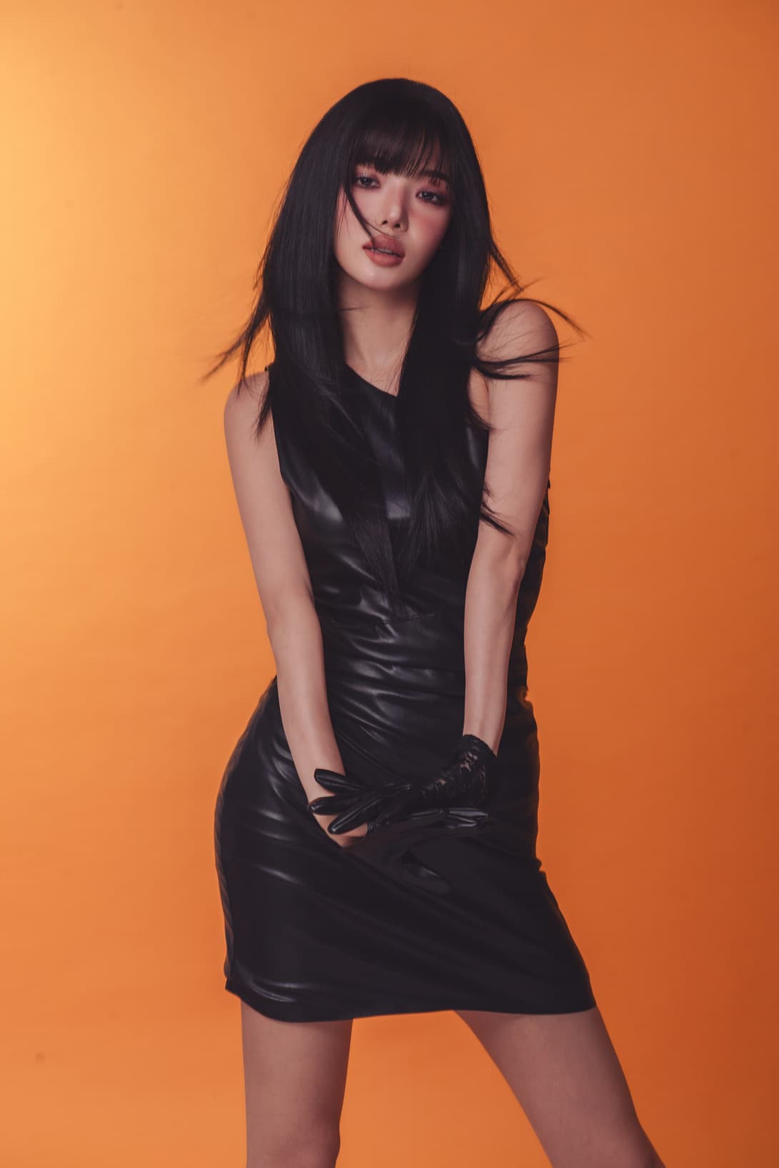 Roh Ji Sun in orange-tinted leather, China Hub editorial portrait